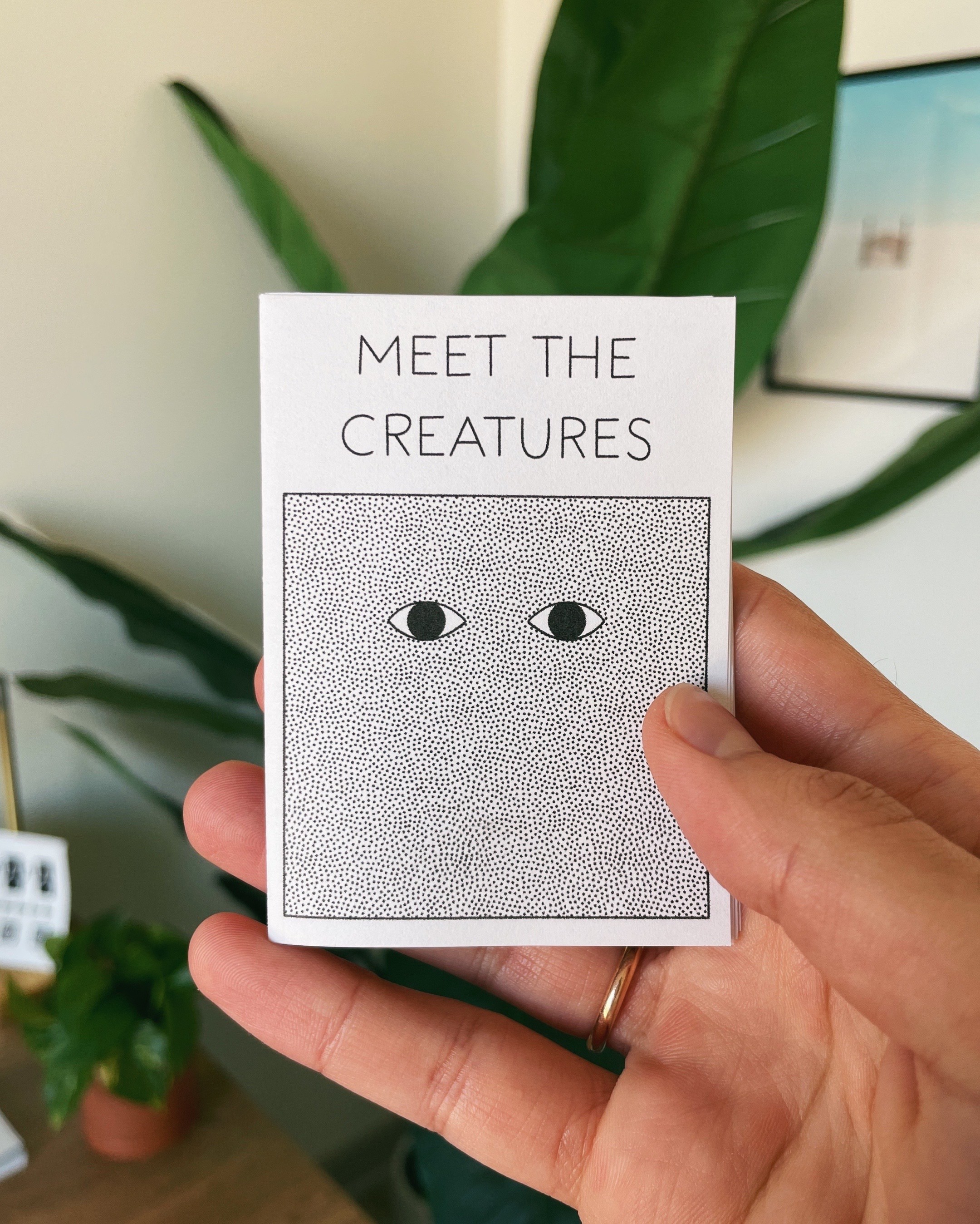 Two pages from a zine. One page shows a drawing of a frog with the text "Welcome to the ribbit exhibit, that'll be $10." Another page shows a drawing of a black sheep with the text "They say I'm the black sheep. I think my wool is pretty cool"